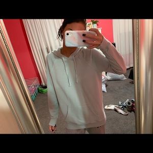 light blue hooded sweatshirt